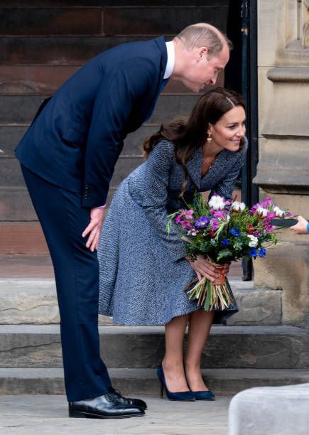 Prince William, Duke of Cambridge, and Catherine, Duchess of Cambridge, depart after attending the official opening of t