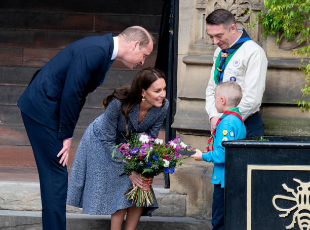 Prince William, Duke of Cambridge, and Catherine, Duchess of Cambridge, depart after attending the official opening of the Glade of Light Memorial at Manchester Cathedral on May 10, 2022 in Manchester, England. The Glade of Light Memorial commemorates the victims of the terrorist attack that took place after an Ariana Grande concert at Manchester Arena on May 22, 2017. (612×454)