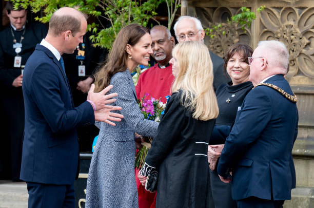 Prince William, Duke of Cambridge, and Catherine, Duchess of Cambridge, depart after attending the official opening of the Glade of Light Memorial at Manchester Cathedral on May 10, 2022 in Manchester, England. The Glade of Light Memorial commemorates the victims of the terrorist attack that took place after an Ariana Grande concert at Manchester Arena on May 22, 2017. (612×405)