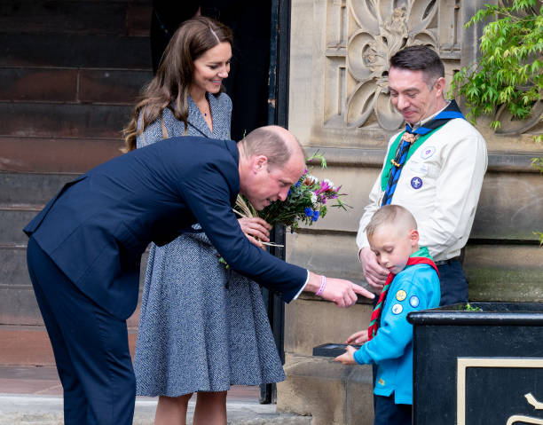 Prince William, Duke of Cambridge, and Catherine, Duchess of Cambridge, depart after attending the official opening of the Glade of Light Memorial at Manchester Cathedral on May 10, 2022 in Manchester, England. The Glade of Light Memorial commemorates the victims of the terrorist attack that took place after an Ariana Grande concert at Manchester Arena on May 22, 2017. (612×479)