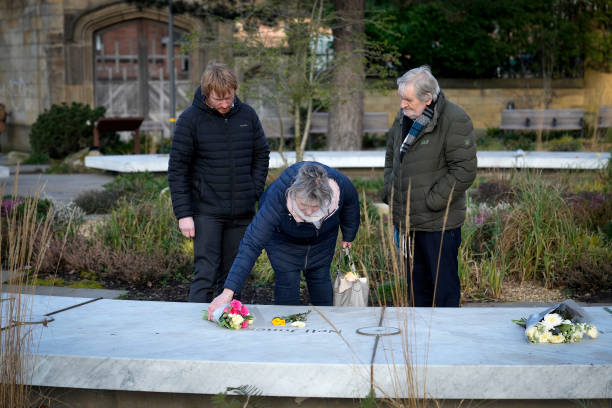 Relatives place flowers on the 'Glade of Light' memorial to the victims of the 2017 Manchester Arena bomb attack, after today's publication of the independent public inquiry investigating the deaths of the victims, on March 02, 2023 in Manchester, England. The independent public inquiry investigating the deaths of the victims of the 2017 Manchester Arena terror attack at an Ariana Grande concert is presided over by Sir John Saunders, the Coroner responsible for conducting the Inquests arising from the deaths of the 22 people killed. The third and final report of the inquiry, The final report, focusing on MI5 and police, is published today. (612×408)