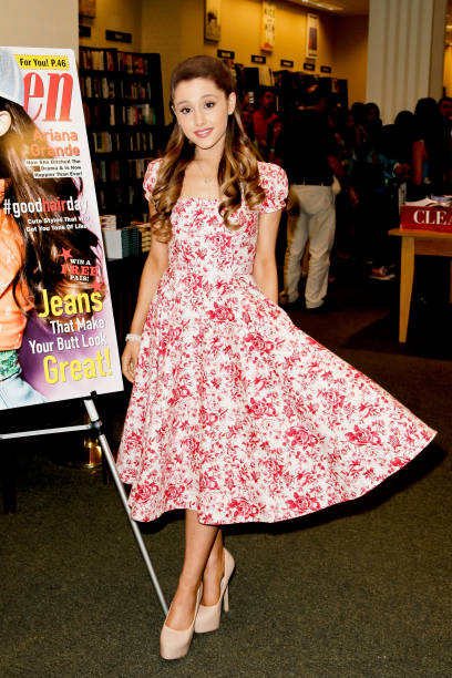 Ariana Grande signs copies of the August edition of Seventeen Magazine at Barnes & Noble at The Americana at Brand on Ju
