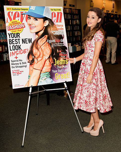 Ariana Grande signs copies of the August edition of Seventeen Magazine at Barnes & Noble at The Americana at Brand on July 8, 2013 in Los Angeles, California. — frame 1/28 (486×612)