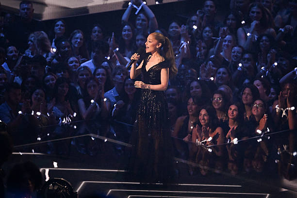 Ariana Grande speaks onstage at the MTV Video Music Awards 2025 held at UBS Arena on September 07, 2025 in New York, New York. — frame 7/100 (612×408)