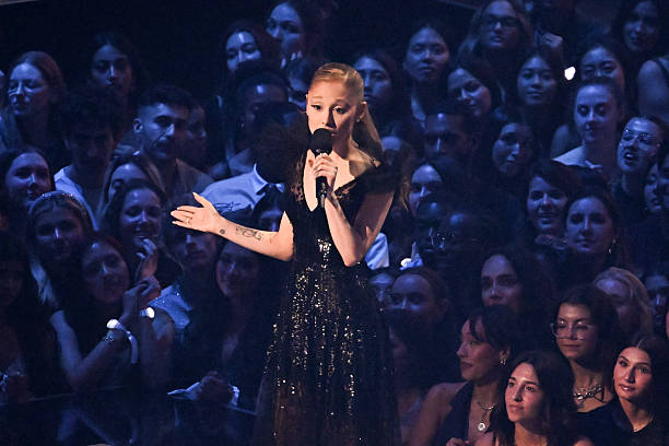 Ariana Grande speaks onstage at the MTV Video Music Awards 2025 held at UBS Arena on September 07, 2025 in New York, New York. — frame 4/100 (612×408)