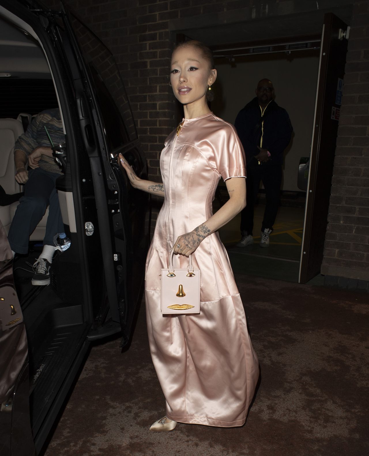 Ariana Grande Stuns in $7,100 Schiaparelli Dress After First Oscar Nod