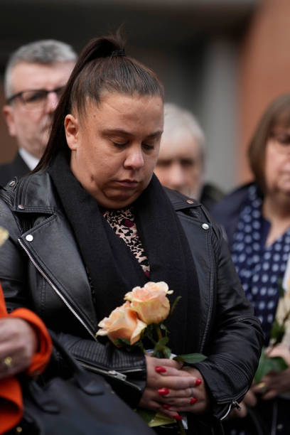 Victims families listen as their representative Richard Scorer from Slater and Gordon solicitors, makes a statement outside Manchester Magistrates' Court as the final report on the Manchester Arena attack is published, on March 2, 2023 in Manchester, United Kingdom. The independent public inquiry investigating the deaths of the victims of the 2017 Manchester Arena terror attack at an Ariana Grande concert is presided over by Sir John Saunders, the Coroner responsible for conducting the Inquests arising from the deaths of the 22 people killed. The third and final report of the inquiry, The final report, focusing on MI5 and police, is published today. (408×612)