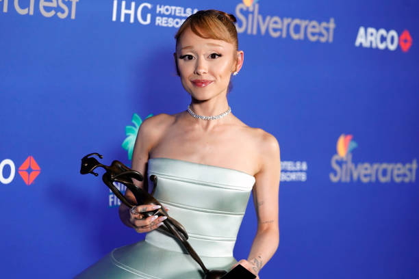Ariana Grande, winner of the Rising Star Award, poses backstage during the 36th Annual Palm Springs International Film A