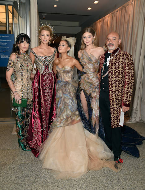 Blake Lively, Ariana Grande, Gigi Hadid and Christian Louboutin attend the Heavenly Bodies: Fashion & The Catholic Imagination Costume Institute Gala at The Metropolitan Museum of Art on May 7, 2018 in New York City. — frame 18/39 (467×612)