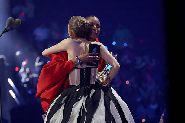Ciara presents Ariana Grande with the Best Pop Award for “Brighter Days Ahead” during the 2025 MTV Video Music Awards at