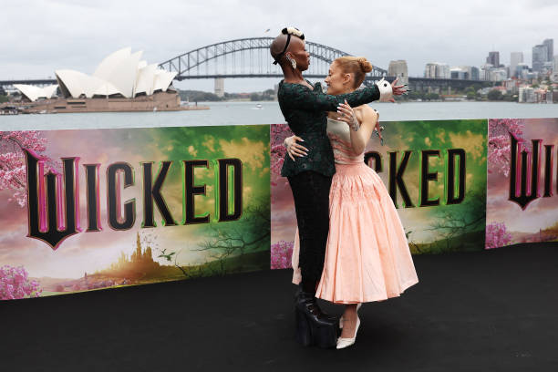 Cynthia Erivo and Ariana Grande pose for a photocall at Mrs Macquarie's Chair during the Australian premiere of "Wicked"