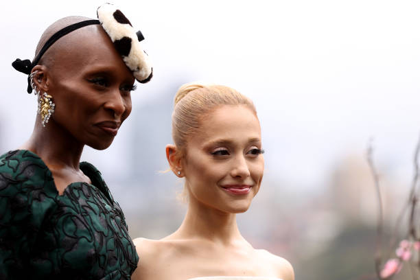 Cynthia Erivo and Ariana Grande pose for a photocall at Mrs Macquarie's Chair during the Australian premiere of "Wicked"