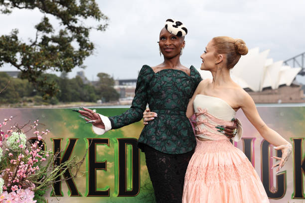 Cynthia Erivo and Ariana Grande pose for a photocall at Mrs Macquarie's Chair during the Australian premiere of "Wicked"