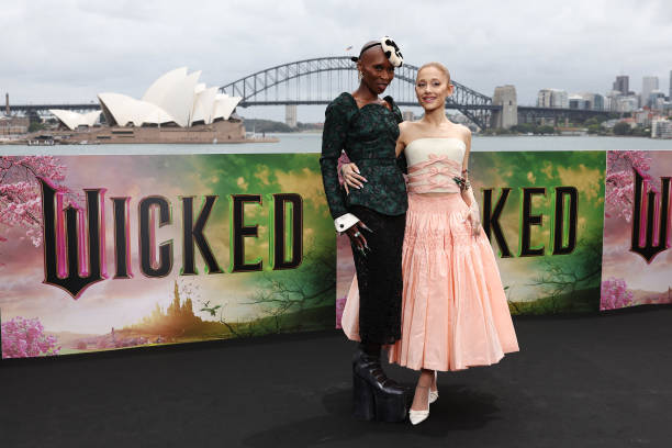 Cynthia Erivo and Ariana Grande pose for a photocall at Mrs Macquarie's Chair during the Australian premiere of "Wicked"