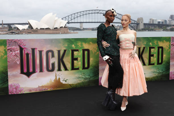 Cynthia Erivo and Ariana Grande pose for a photocall at Mrs Macquarie's Chair during the Australian premiere of "Wicked"