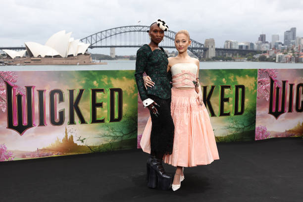 Cynthia Erivo and Ariana Grande pose for a photocall at Mrs Macquarie's Chair during the Australian premiere of "Wicked"