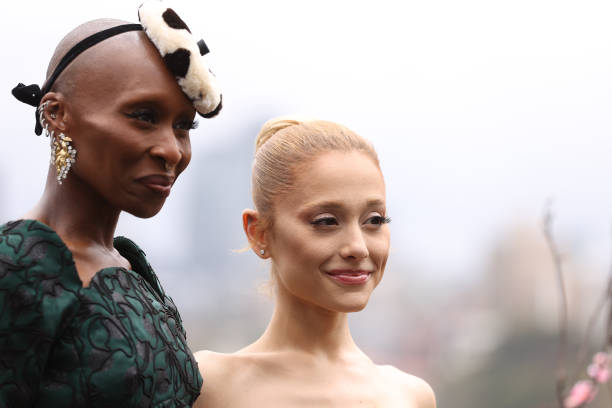 Cynthia Erivo and Ariana Grande pose for a photocall at Mrs Macquarie's Chair during the Australian premiere of "Wicked"