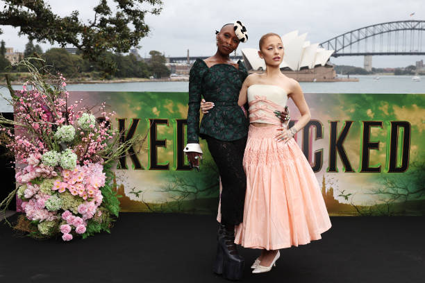 Cynthia Erivo and Ariana Grande pose for a photocall at Mrs Macquarie's Chair during the Australian premiere of "Wicked"