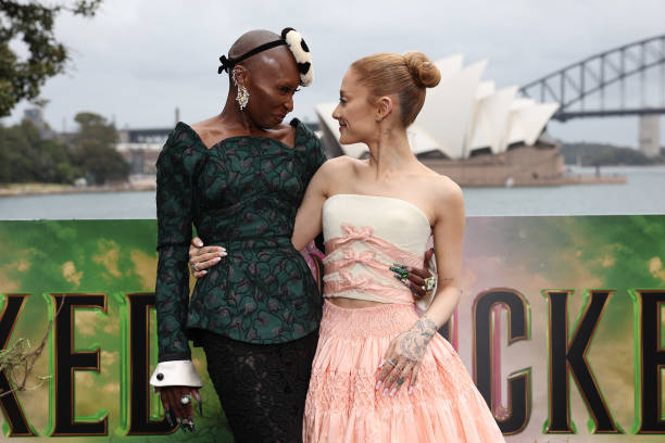 Cynthia Erivo and Ariana Grande pose for a photocall at Mrs Macquarie's Chair during the Australian premiere of "Wicked"