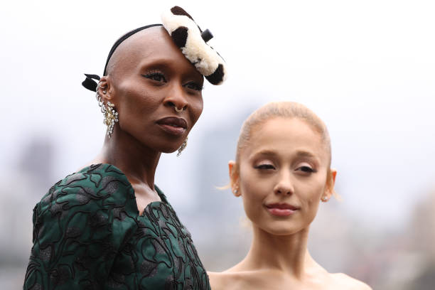 Cynthia Erivo and Ariana Grande pose for a photocall at Mrs Macquarie's Chair during the Australian premiere of "Wicked"