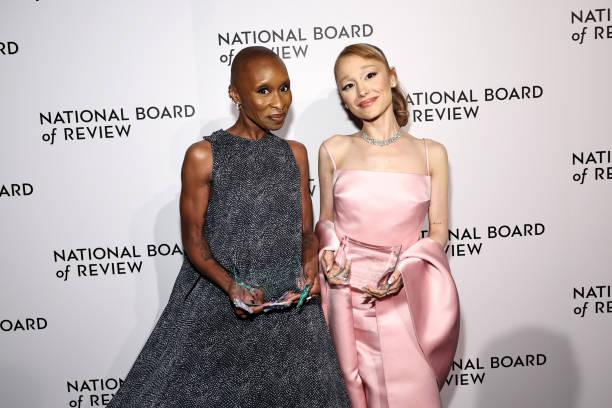Cynthia Erivo and Ariana Grande pose with the NBR Spotlight Award: Creative Collaboration for "Wicked" during The Nation
