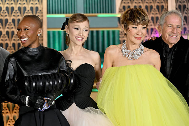 Cynthia Erivo, Ariana Grande, Michelle Yeoh, and Marc E. Platt attend as Universal Pictures proudly presents the WICKED FOR GOOD US Premiere on November 17, 2025 in New York City. (612×408)