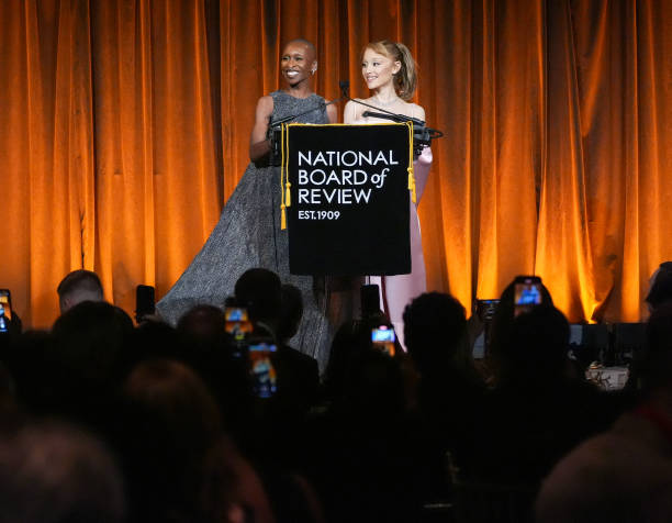 Cynthia Erivo, Ariana Grande speak onstage at The National Board of Review Gala held at Cipriani on January 7, 2025 in N