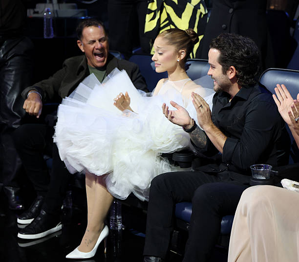 Ed Butera, Ariana Grande, and Christian Breslauer attend the 2025 MTV Video Music Awards at UBS Arena on September 07, 2025 in Elmont, New York. — frame 121/246 (612×535)