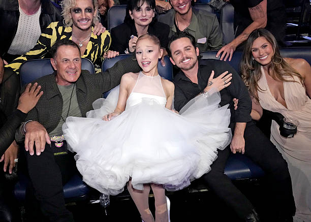 Ed Butera, Ariana Grande, Christian Breslauer and Brittany Breslauer attend the 2025 MTV Video Music Awards at UBS Arena on September 07, 2025 in Elmont, New York. — frame 87/246 (612×437)