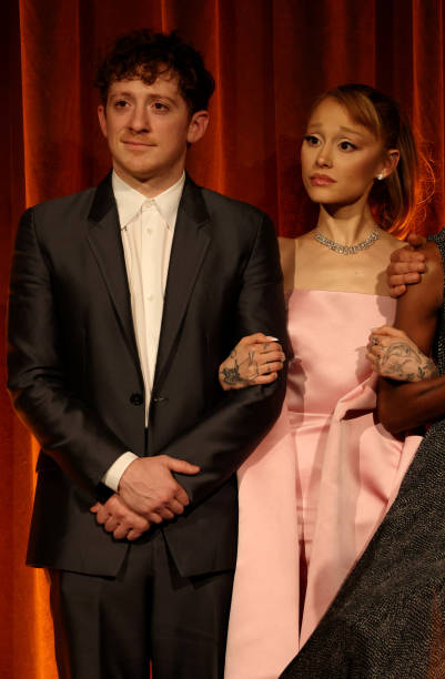 Ethan Slater and Ariana Grande accept the Best Film Award for "Wicked" onstage during The National Board of Review Annua