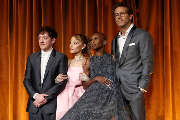 Ethan Slater, Ariana Grande, and Cynthia Erivo accept the Best Film Award for "Wicked" from Ryan Reynolds onstage during The National Board of Review Annual Awards Gala at Cipriani 42nd Street on January 07, 2025 in New York City. (612×408)