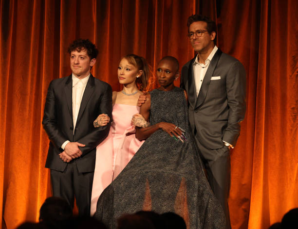 Ethan Slater, Ariana Grande, and Cynthia Erivo accept the Best Film Award for "Wicked" from Ryan Reynolds onstage during The National Board of Review Annual Awards Gala at Cipriani 42nd Street on January 07, 2025 in New York City. (612×472)