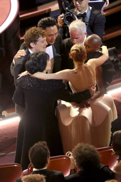 Ethan Slater, Jon M. Chu, Ariana Grande, Cynthia Erivo, and others during the 97th Annual Oscars at Dolby Theatre on March 02, 2025 in Hollywood, California. — frame 132/202 (408×612)
