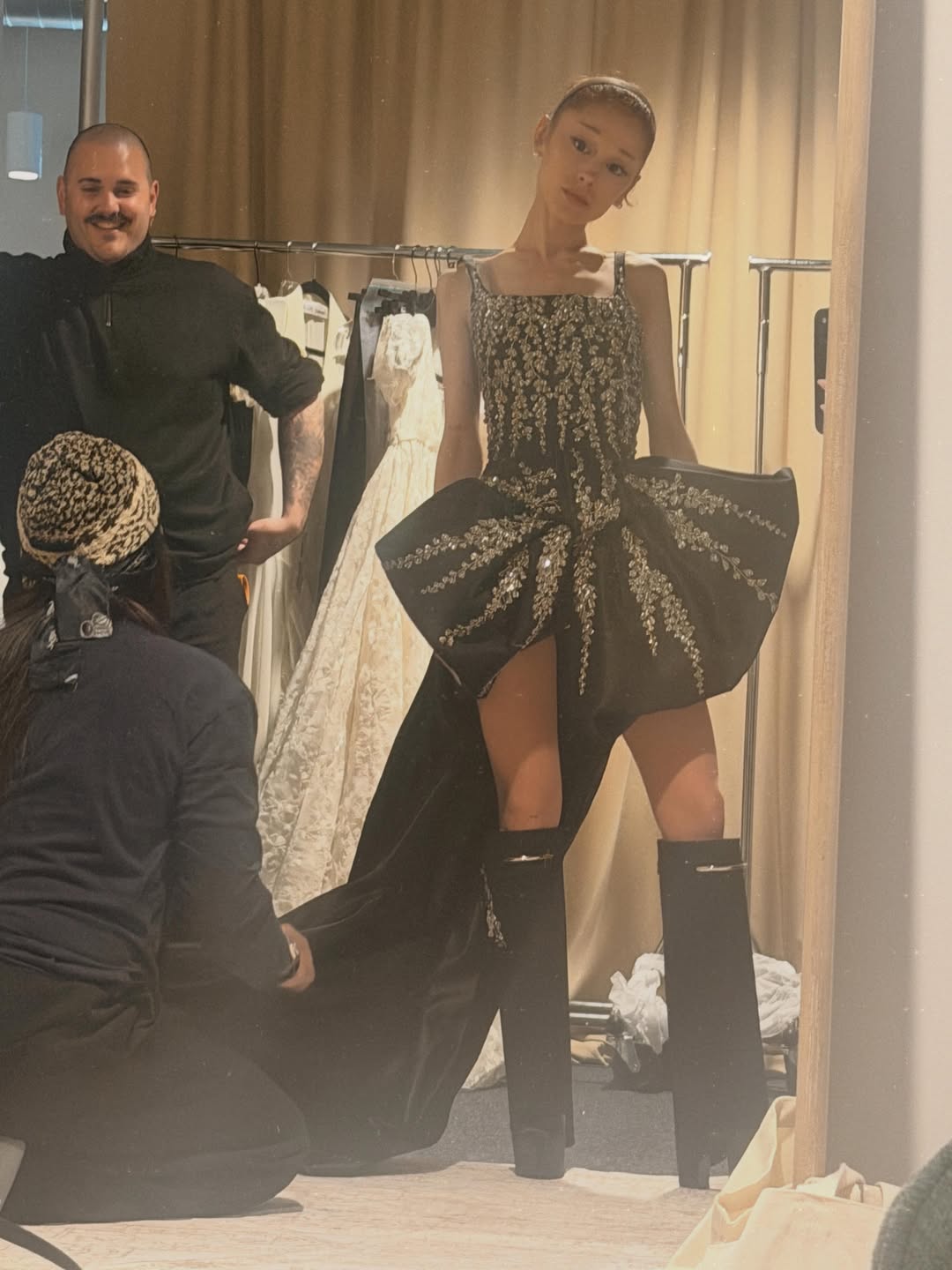 Photo shared by Ariana Grande on June 09, 2026 tagging @luxurylaw, @thereismans, @yvonneshelly, and @givenchy. May be an image of gown, dress and text. (1080×1440)
