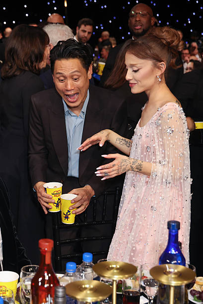 Jon M. Chu and Ariana Grande attend the 31st Annual Critics' Choice Awards at Barker Hangar on January 04, 2026 in Santa Monica, California. — frame 91/105 (409×612)