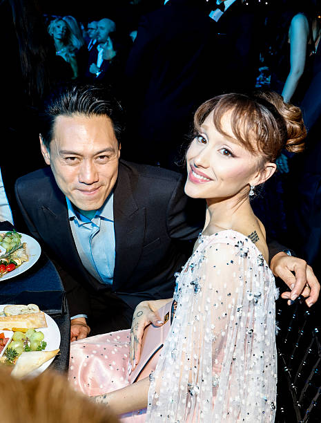 Jon M. Chu and Ariana Grande attend the 31st Annual Critics Choice Awards at Barker Hangar on January 04, 2026 in Santa 