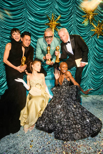 Michelle Yeoh, Jon M. Chu, Ariana Grande, Jeff Goldblum, Marc E. Platt, Cynthia Erivo photographed backstage during the 82nd Annual Golden Globes held at the Beverly Hilton on January 05, 2025 in Beverly Hills, California. (408×612)