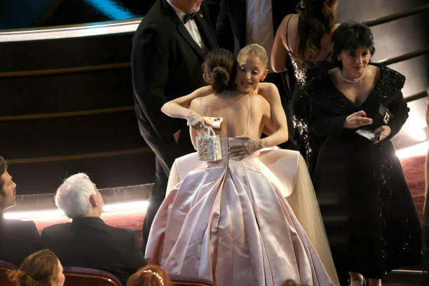 Monica Barbaro, Ariana Grande, and Joan Grande are seen during the 97th Annual Oscars at Dolby Theatre on March 02, 2025