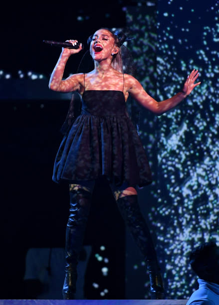 Recording artist Ariana Grande performs during the 2018 Billboard Music Awards at MGM Grand Garden Arena on May 20, 2018 in Las Vegas, Nevada. (439×612)
