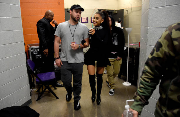 Scooter Braun and Ariana Grande walk backstage during the "Dangerous Woman" Tour Opener at Talking Stick Resort Arena on February 3, 2017 in Phoenix, Arizona. (612×398)