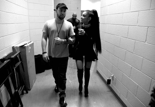 Scooter Braun and Ariana Grande walk backstage during the "Dangerous Woman" Tour Opener at Talking Stick Resort Arena on February 3, 2017 in Phoenix, Arizona. (612×422)