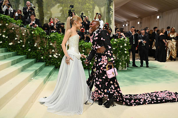 Singer Ariana Grande and British actress Cynthia Erivo arrive for the 2024 Met Gala at the Metropolitan Museum of Art on May 6 in New York. The Gala raises money for the Metropolitan Museum of Art's Costume Institute. The Gala's 2024 theme is "Sleeping Beauties: Reawakening Fashion." (612×408)