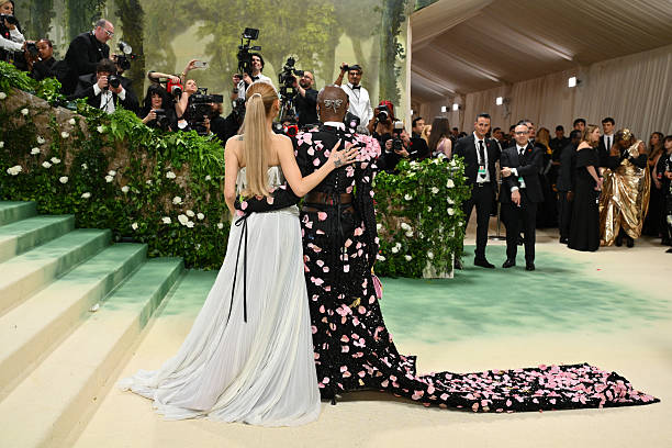 Singer Ariana Grande and British actress Cynthia Erivo arrive for the 2024 Met Gala at the Metropolitan Museum of Art on May 6 in New York. The Gala raises money for the Metropolitan Museum of Art's Costume Institute. The Gala's 2024 theme is "Sleeping Beauties: Reawakening Fashion." (612×408)