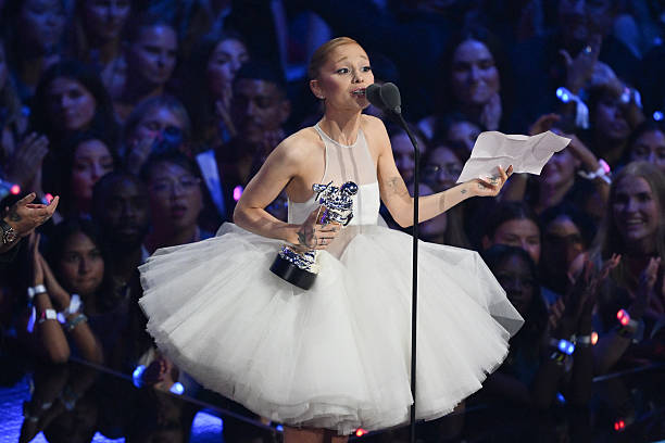 Singer-songwriter Ariana Grande accepts the award for Video of the Year for "Brighter Days Ahead" on stage during the MTV Video Music Awards at UBS Arena in Elmont, New York, on September 7, 2025. (612×408)
