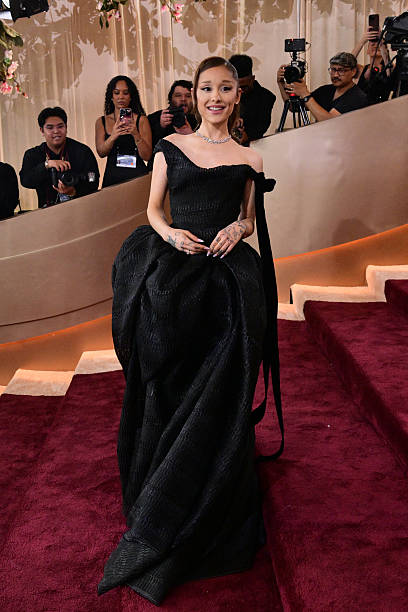 Singer-Songwriter Ariana Grande attends the 83rd annual Golden Globe Awards at the Beverly Hilton hotel in Beverly Hills, California, on January 11, 2026. / -- IMAGE RESTRICTED TO EDITORIAL USE - STRICTLY NO COMMERCIAL USE -- — frame 110/135 (408×612)