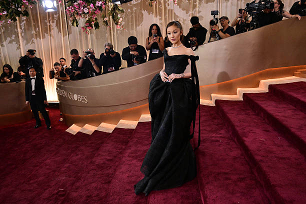 Singer-Songwriter Ariana Grande attends the 83rd annual Golden Globe Awards at the Beverly Hilton hotel in Beverly Hills, California, on January 11, 2026. / -- IMAGE RESTRICTED TO EDITORIAL USE - STRICTLY NO COMMERCIAL USE -- — frame 104/135 (612×408)