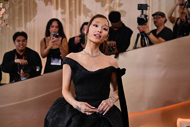 Singer-Songwriter Ariana Grande attends the 83rd annual Golden Globe Awards at the Beverly Hilton hotel in Beverly Hills, California, on January 11, 2026. / -- IMAGE RESTRICTED TO EDITORIAL USE - STRICTLY NO COMMERCIAL USE -- — frame 106/135 (612×408)