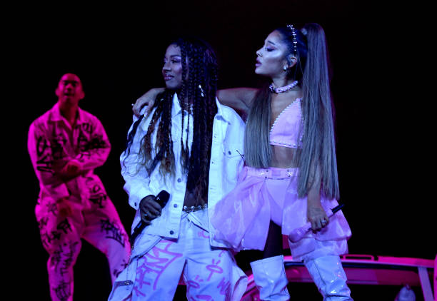 Victoria Monet and Ariana Grande perform onstage during Ariana Grande Sweetener World Tour at Staples Center on May 07, 