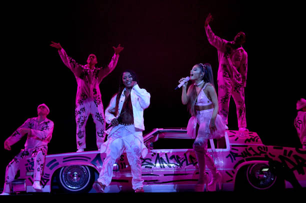 Victoria Monet and Ariana Grande perform onstage during Ariana Grande Sweetener World Tour at Staples Center on May 07, 